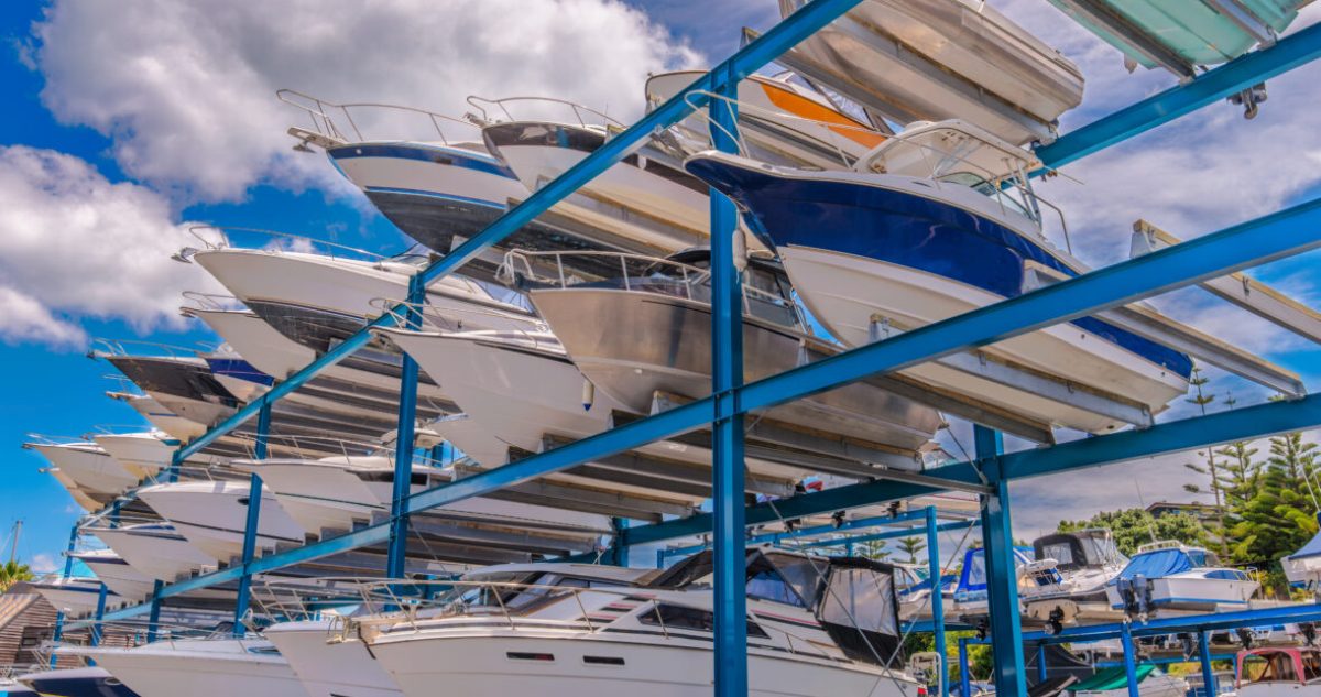 Boats, yachts stored up in dry storage waiting for maintenance